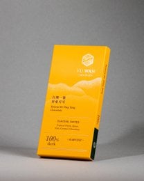 Chocolate bar with a bright yellow packaging featuring the text "Taiwan #1 Ping Tung 100%". The packaging has a simple, minimalist design with a circular logo.