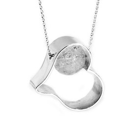 Silver heart-shaped pendant with a smoky quartz or rock crystal center stone.