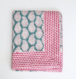 Rectangular tablecloth in blue and pink patterns, suitable for a 4-6 person table.