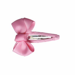 Pink hair bow with clip, made of grosgrain ribbon, for kids' accessories.