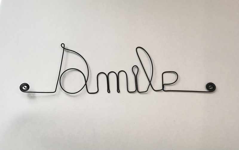 Wire word “Smile”
