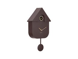 Modern cuckoo wall clock, dark brown color, house-shaped design, minimalist style, gold accents, pendulum.