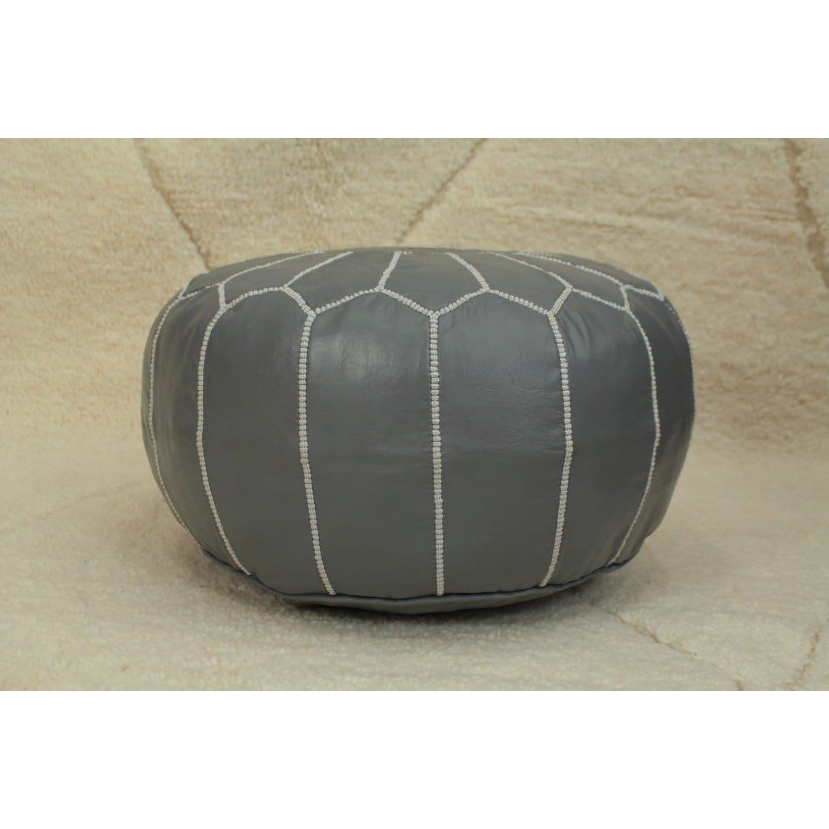 Pouf marocchino in pelle grigia