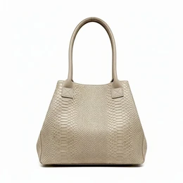 Olive green leather tote bag with snake skin texture and two top handles.