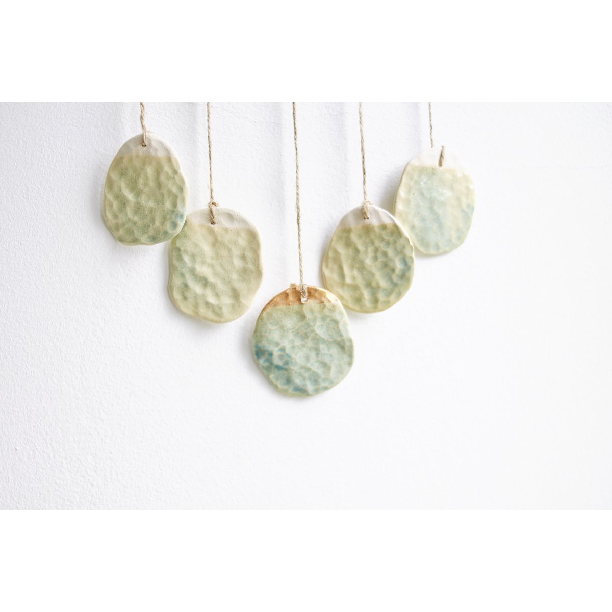 Bohemian wall hanger made of ceramic