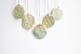 Bohemian wall hanger made of ceramic