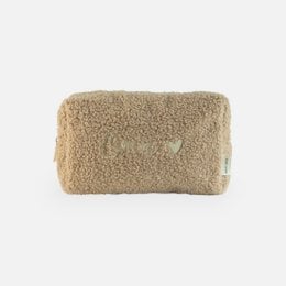 A brown, plush toiletry bag with the text "grandma" printed on it, suitable for kids.