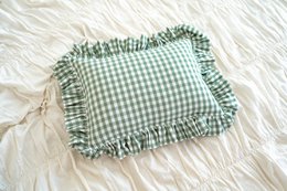 Decorative pillow with ruffle "Sage check"