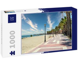  A 1000-piece puzzle depicting a scenic promenade along the coast in Los Alcázares, Murcia, Spain. The image shows a paved walkway lined with palm trees and overlooking the turquoise waters of the Mediterranean Sea.