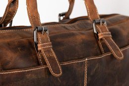 Buffaloing skuldertaske med håndtag Cognac Arrigo