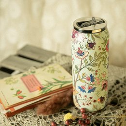 Insulated can - 500ml - Milano, a travel cup with a blue and white marble-like pattern, suitable for hot and cold beverages.