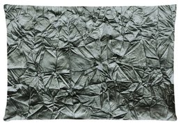 Crushed velvet blue cushion cover with a textured, crumpled appearance.