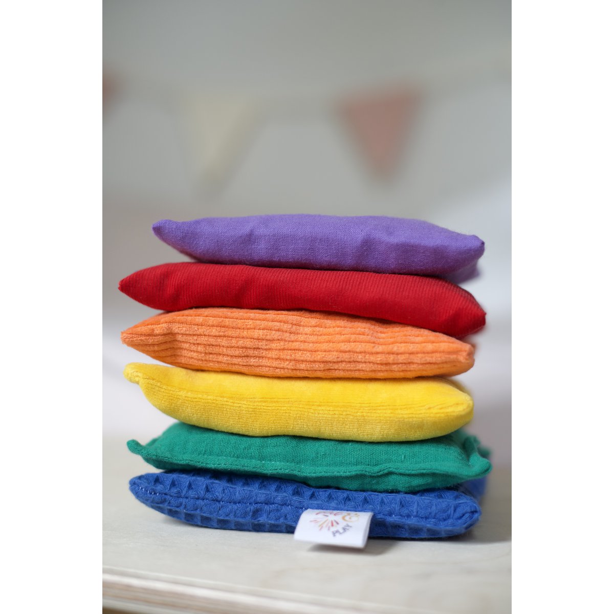 Pittenzakjes regenboog, sensory bean bag rainbow, kirschkernkissen regenbogen