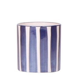 A round, blue and white striped ceramic plant pot with a white orchid plant inside.