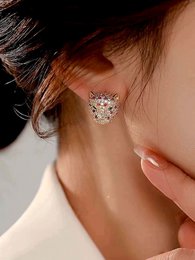 Regal Jeweled Leopard Head Stud Earrings