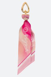  Elegant pink and gold keychain with a heart-shaped charm and a swirling, abstract design.