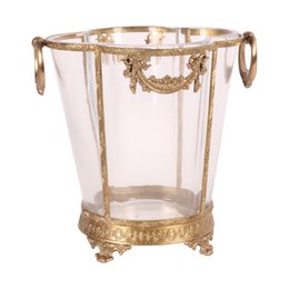 Elegant gold-trimmed glass champagne cooler with ornate floral design.