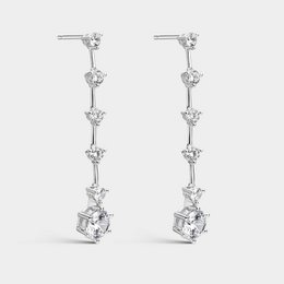 Long silver earrings with white zirconia