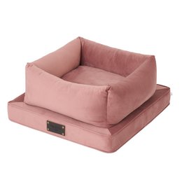 Soft, plush pet bed in dusty pink color made of velour material, suitable for dogs and cats.