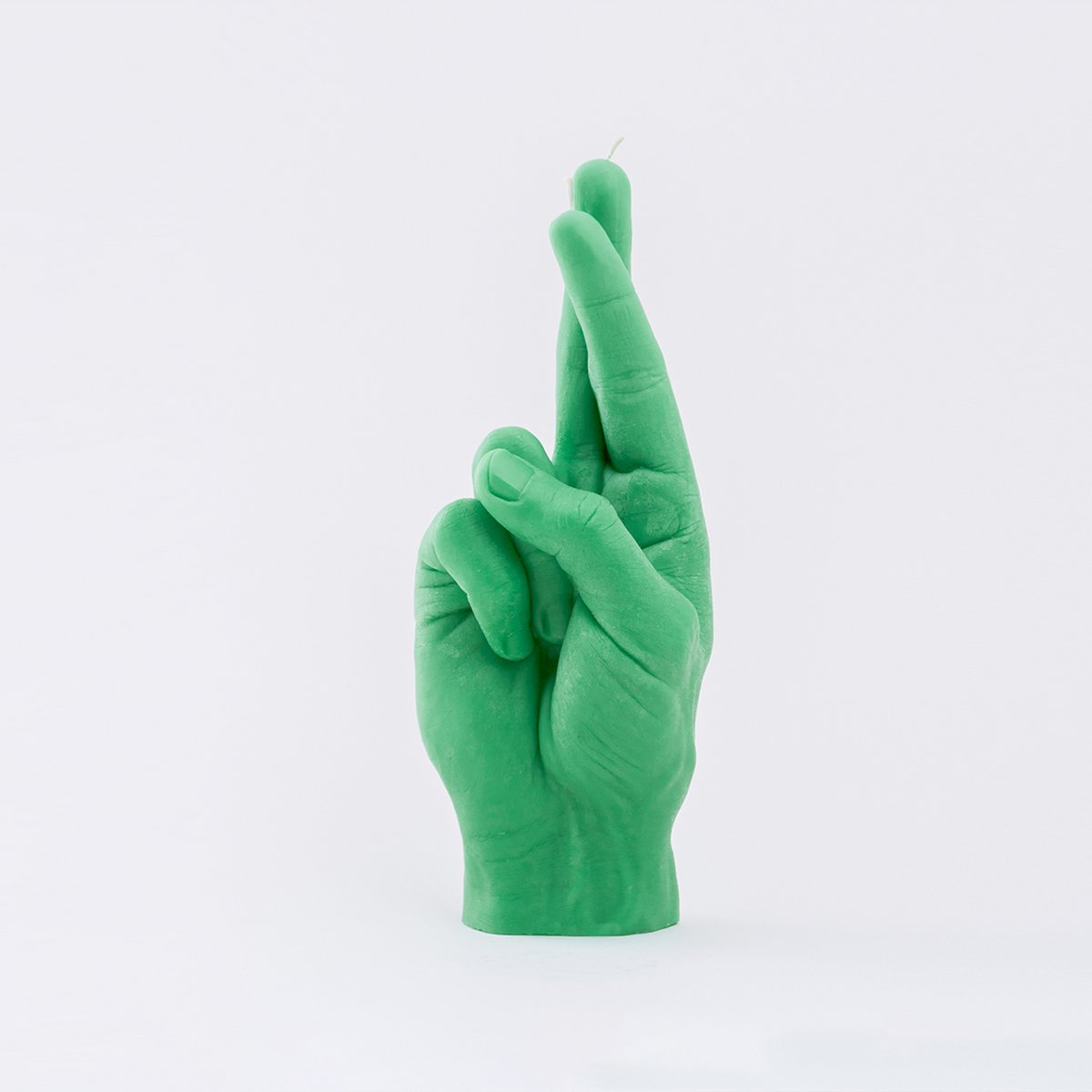 Gekreuzte Finger Kerzengrün