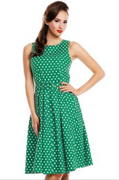A classic vintage-inspired sailor dress in a vibrant green color with a polka dot pattern. The dress features a sleeveless design, a fitted bodice, and a flared skirt that falls to a knee-length. The dress is made from a lightweight, breathable fabric and is available in a range of sizes.