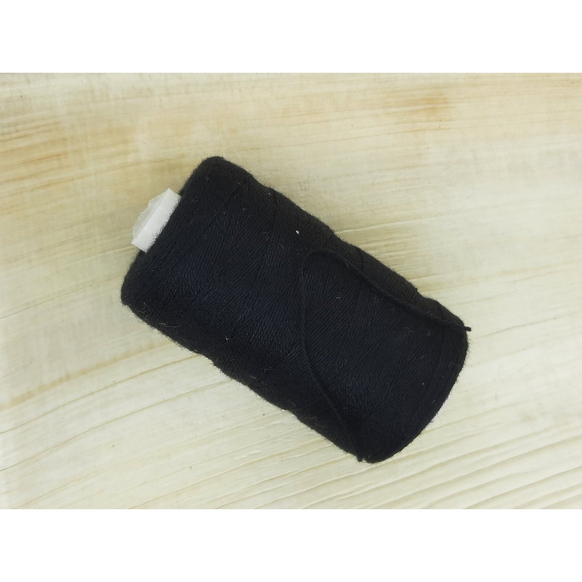 %2340 black sewing thread on a roll