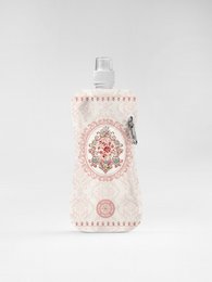 A colorful, floral-patterned water bottle made for travel. Features a variety of vibrant flowers and plants.
