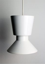 A modern, minimalist white pendant light with a simple, hourglass-shaped design. The light features a smooth, matte finish and a sleek, streamlined silhouette that would complement a variety of interior styles.