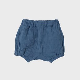 Organic muslin bloomer shorts in indigo color, suitable for infants and toddlers. Features a relaxed, comfortable fit and a classic style.