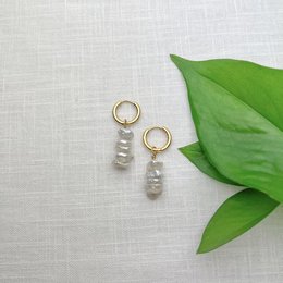 Gold-tone hoop earrings with pearl accents. Available in 15mm and 20mm sizes.