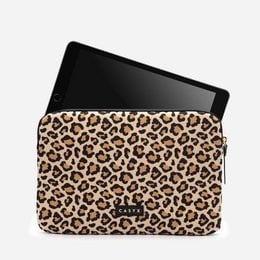 Leopard print iPad sleeve with a zipper closure and a brand logo. The sleeve is made of a durable material and is designed to protect your iPad from scratches and damage.