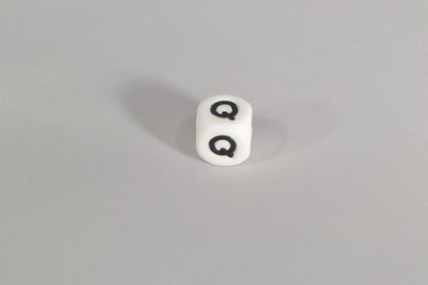 Perlensilikonbuchstabe Q.