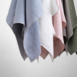 Large beach towel "VILNIA" available in various color combinations including white/black, nature/black, powder/nature, dove blue/nature, brown/nature, white/nature, green/nature, lavender/nature, and mint/nature. Size is 100 x 200 cm.