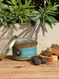 Artichoke cream with green olives, 90g. A savory spread made with artichoke and green olives, perfect for sandwiches, crackers, or as a dip.