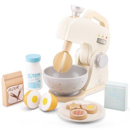 A wooden toy mixer set in white with various baking accessories like eggs, a bowl, and a recipe book. The set includes a stand mixer, mixing bowl, and other kitchen tools for pretend play.