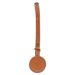 Appendicapelli in pelle di cammello
