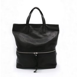 Black leather tote backpack with zipper compartment, versatile and stylish for everyday use.