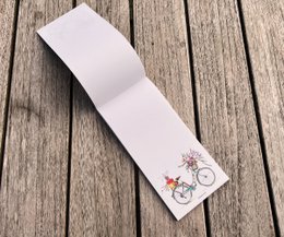 Writing block | Beautiful bike with flowers DIN format (long) 99 x 210 mm | Blank white
