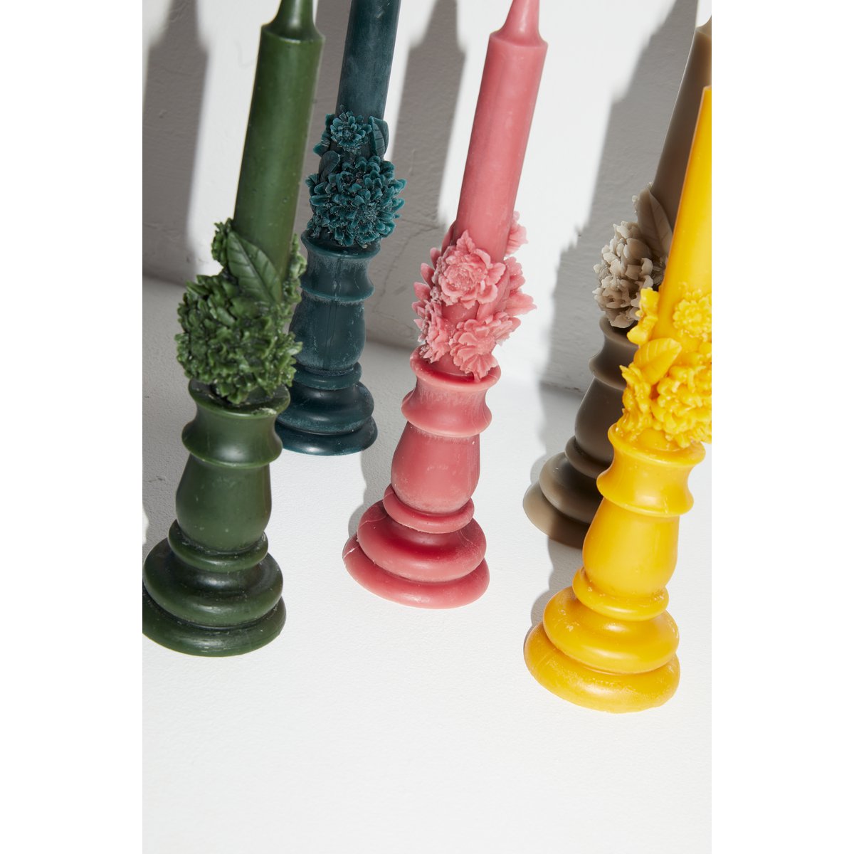 Raw beeswax candela with flowers