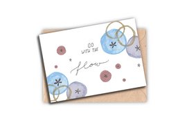 Floral greeting card with blue and purple flowers and polka dot accents.