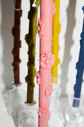 Raw beeswax candle with flowers