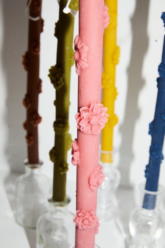 Raw beeswax candle with flowers
