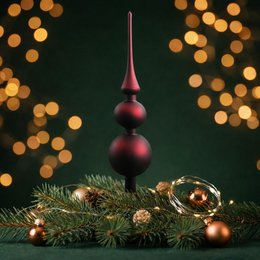 Tall, red and black glass Christmas tree decoration with a classic, elegant design.
