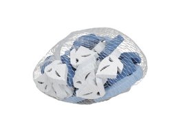 A small, decorative sailing boat statue in shades of blue and white, with a rounded, organic shape.