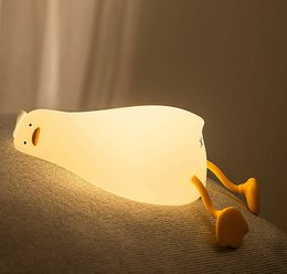 A white duck-shaped night light with 3 brightness settings and a 30-minute timer, suitable for a child's room.