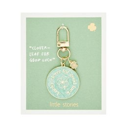  Clover-leaf keychain with "Clever leaf for good luck" text. Made of metal with a gold-tone finish. Suitable for attaching to bags, keys, or other accessories.