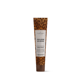  Hand cream tube with leopard print packaging. Moisturizing hand cream in a tube.