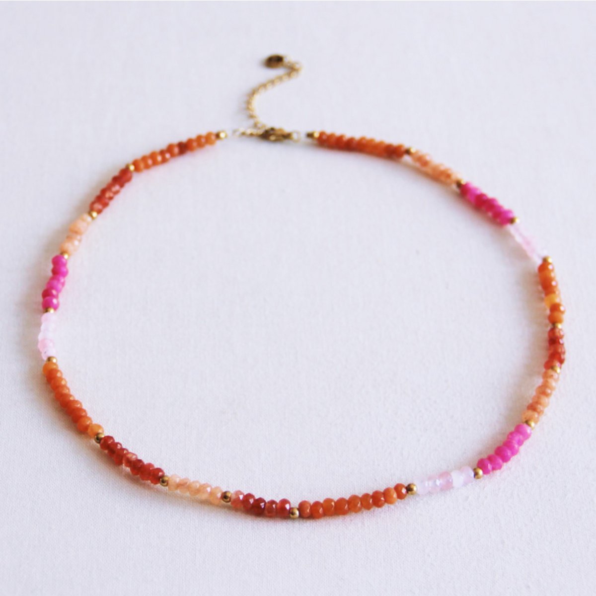 Collar facetado - coral/rosa/naranja