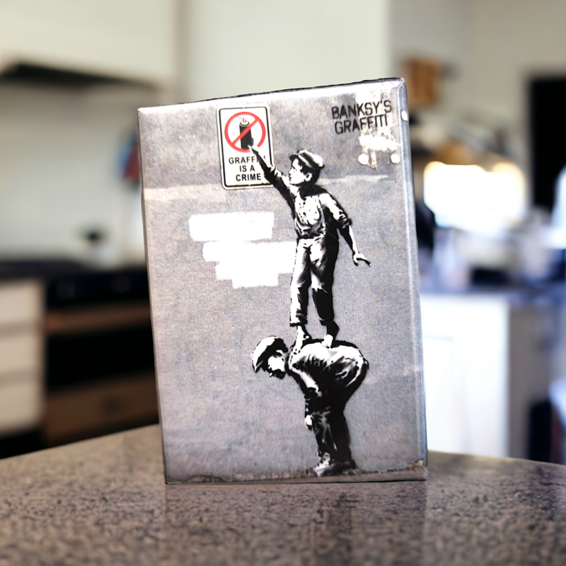 Banksy's Graffiti Fridge Magnet - Graffiti is a Crime