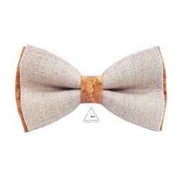 Floral and animal print bow tie with coral accents, suitable for formal or casual wear.